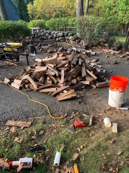 dad and toddler activity chop and stack wood